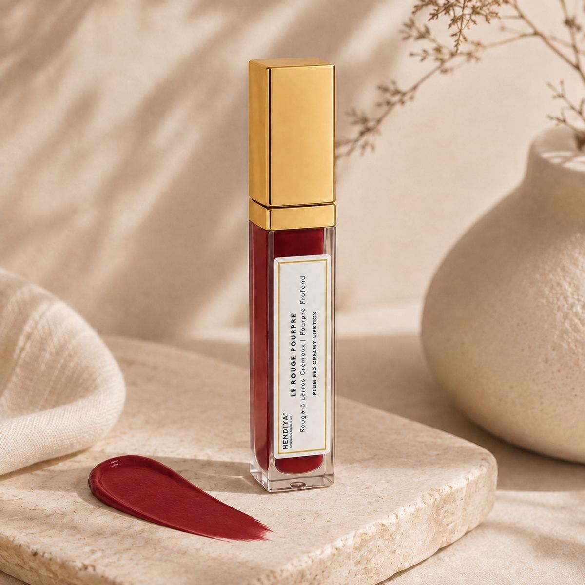 Le Rouge Pourpre Hendiya, creamy organic lipstick styled with natural elements